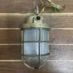 Vintage Brass Ceiling Light with Ribbed Glass Globe close-up showing patina