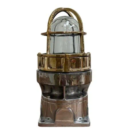Brass and aluminum marine post light with clear dome glass and protective cage