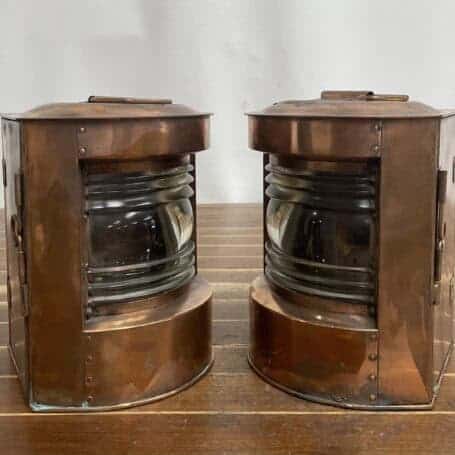 Copper Lantern Set - Nautical Port and Starboard Oil Lamps 05 Copper lantern set – angled view showing Fresnel glass and copper patina
