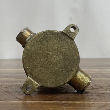 Miniature Vintage Brass Ceiling Light with Plastic Globe 05 brass ceiling fixture bottom view showing mounting tabs and wiring entry