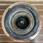 Top-down view of copper anchor light showing interior and socket