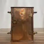 Rear view of nautical running light with hinged access panel