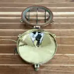 open brass marine fixture showing interior socket