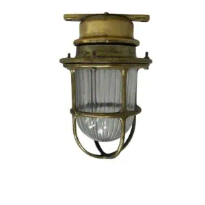 brass nautical bulkhead light front view with ribbed glass globe