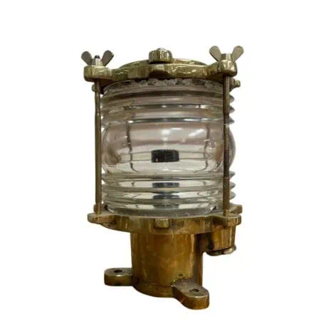 Brass nautical deck light with clear Fresnel lens and solid brass base