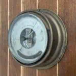 nautical aneroid barometer Takahashi Osaka 1973 angled side view brass housing