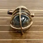brass bulkhead light top view showing dual conduit entries and patina