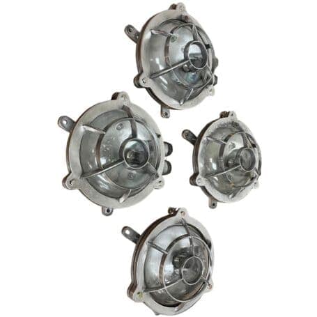Set of 4 Aluminum Ceiling Light Fixtures - Vintage Maritime Style 01 Set of 4 aluminum ceiling light fixtures front view showing glass lens and cage
