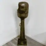 Vintage brass ship binnacle with compass side view showing brass body