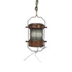 vintage copper ship lantern hanging with chain and visible wiring