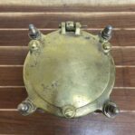 nautical brass dock light top view with hinged lid and mounting bolts