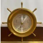 vintage seth thomas helmsman clock and weather barometer barometer close up
