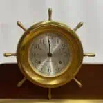 vintage seth thomas helmsman clock and weather barometer clock face detail